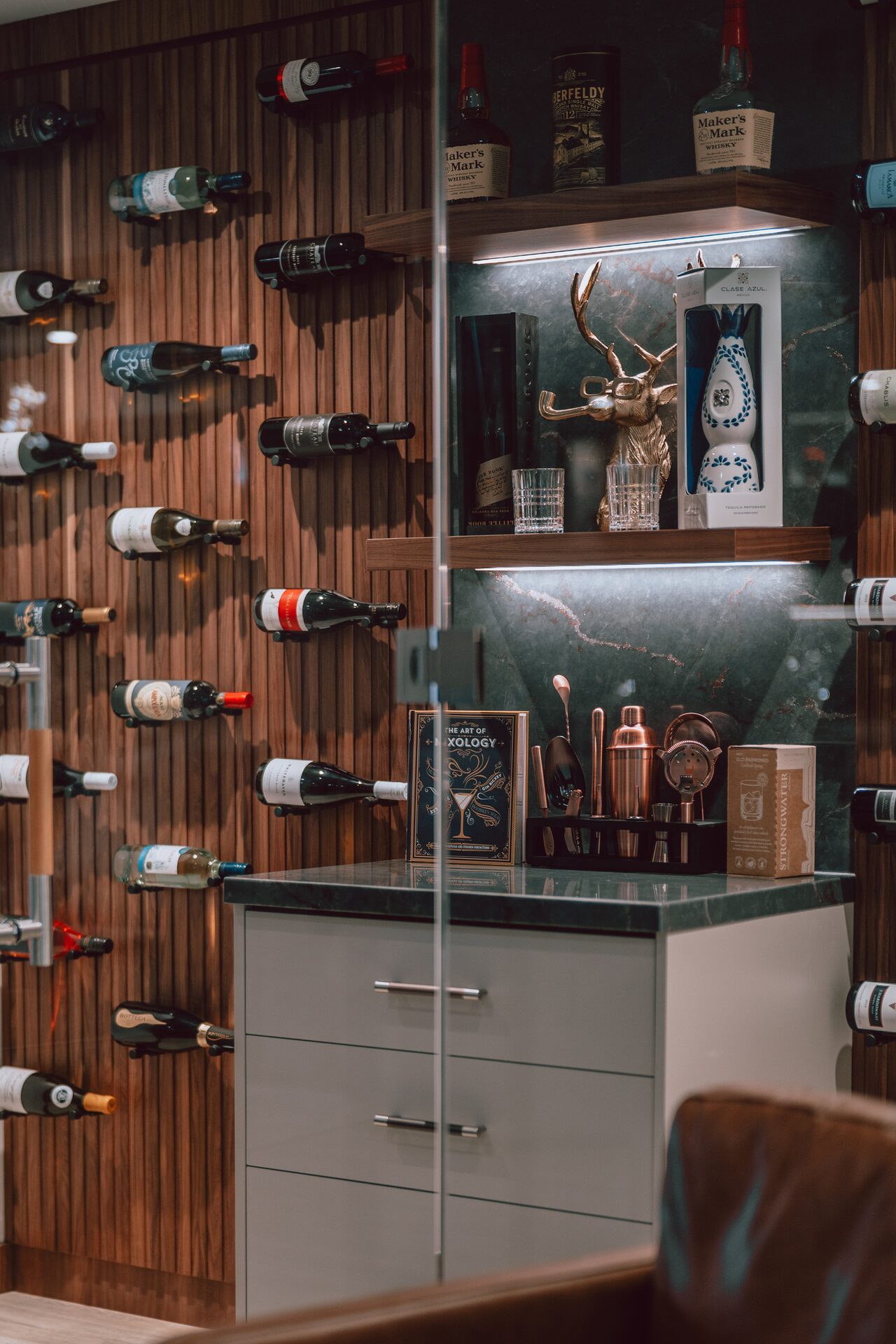 Custom wine bar with bottle racks and cocktail station